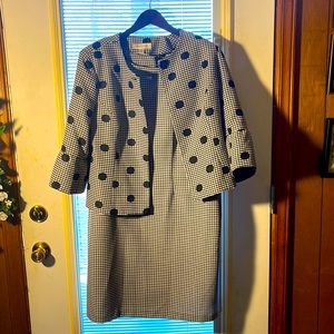 Two piece dress outfit black and white; under your knee length. Puffed sleeve